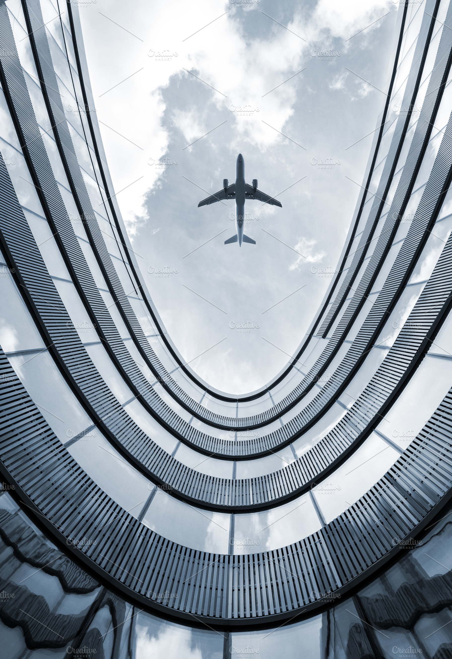Modern building with flying airplane, a Transportation Photo by BOOCYS