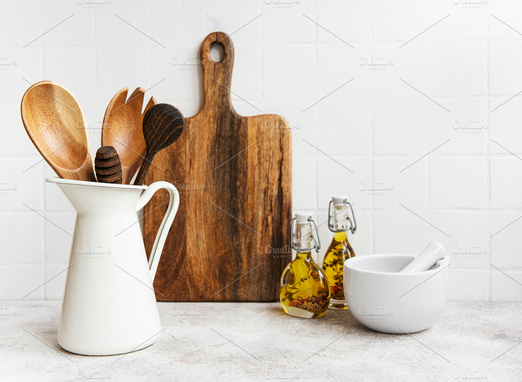 Kitchen utensils, tools and dishware on on the background white, a Food & Drink Photo by Olena Rudo