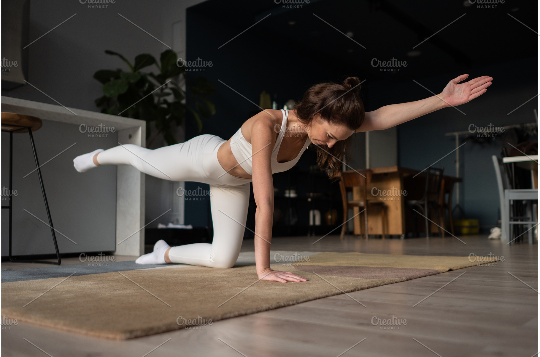 Woman doing bird dog exercise at, a Sports & Recreation Photo by undrey
