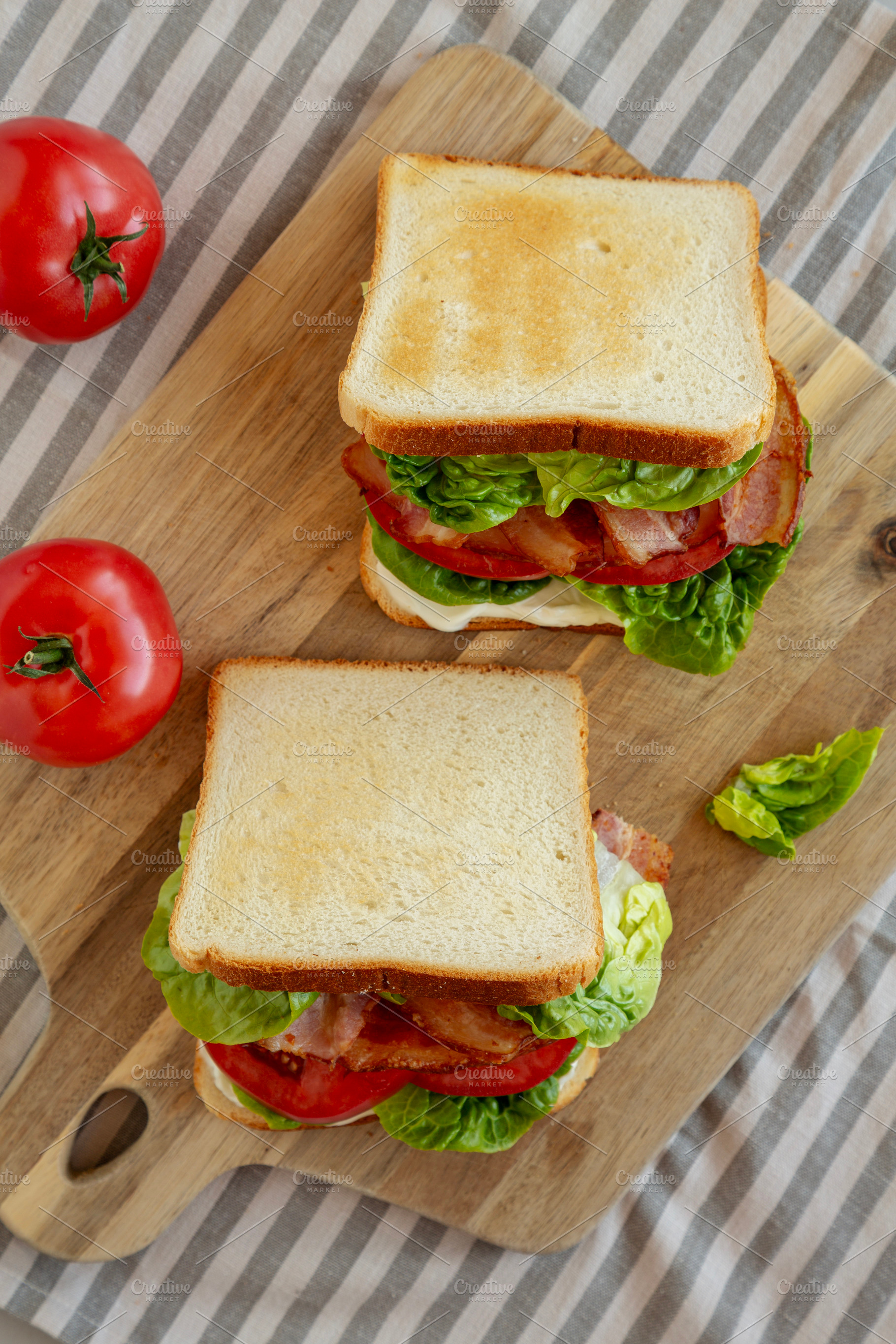 Homemade BLT (Bacon Lettuce Tomato) Sandwich with Mayo, top view, a Food & Drink Photo by LiudmylaChuhunova