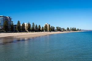 Golden sand and blue waters at Glenelg Beach, Adelaide, Australi, a Nature Photo by GoodGoods