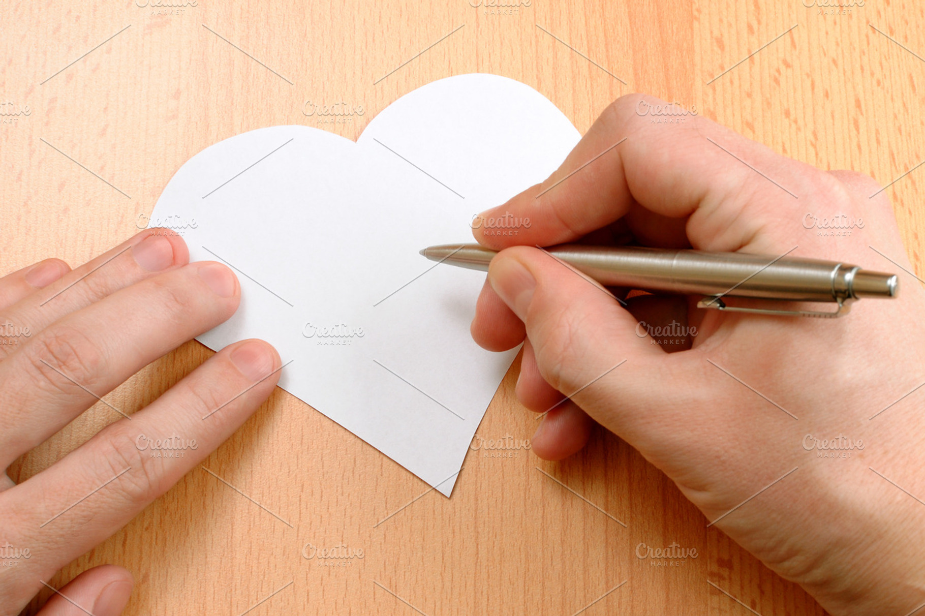 Valentine's day card containing ballpoint, blank, and card