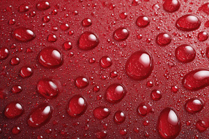 Water droplets are scattered on red, a Photo by Pavel_design