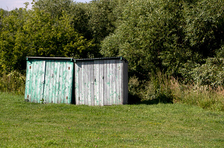 Two wooden sheds in the village, an Architecture Photo by Schreibikus