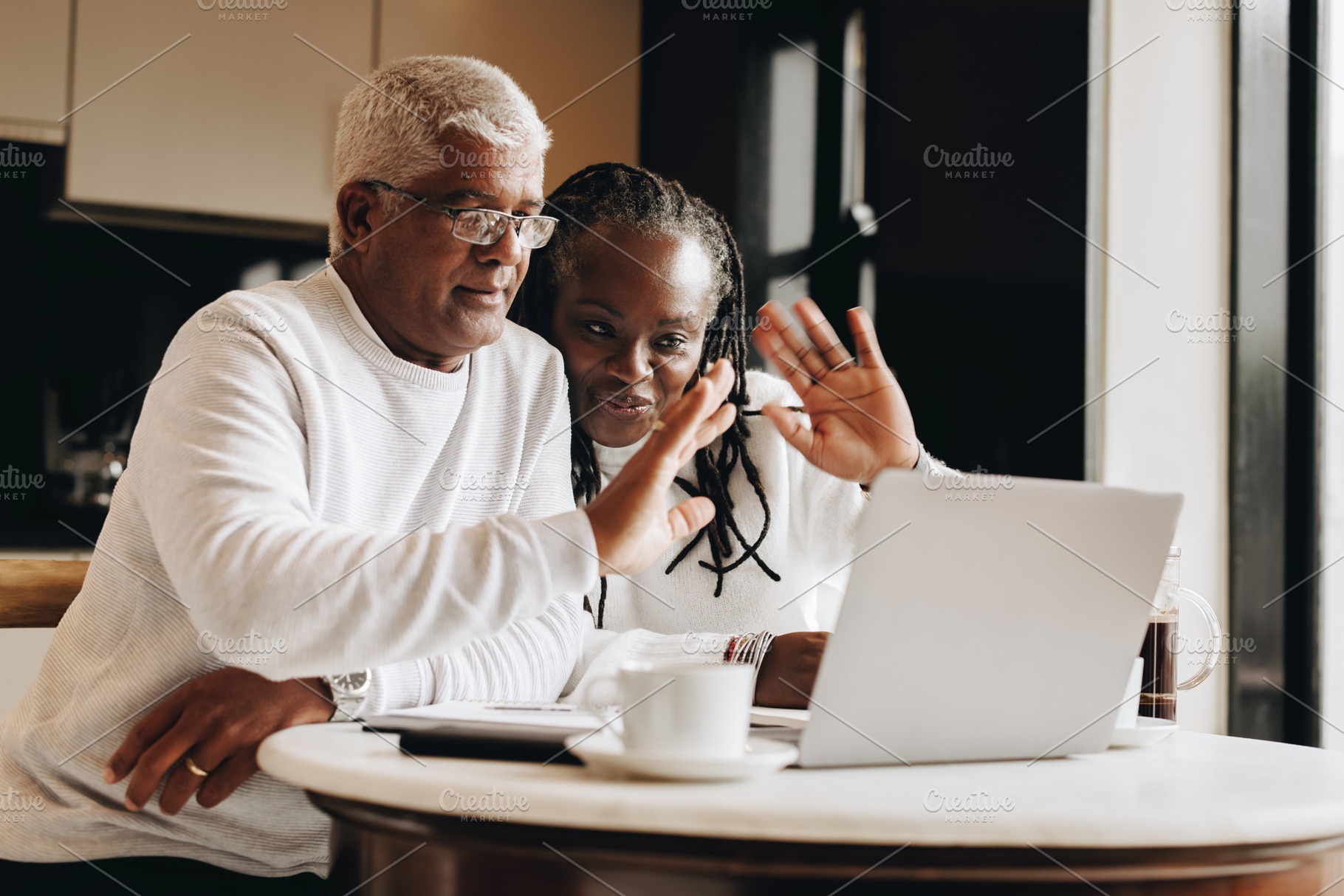 Senior couple having a video call at home, a Person Photo by Jacob Lund