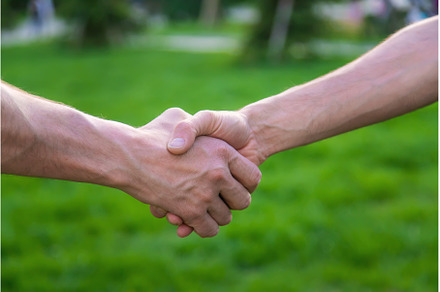 Handshake of men at a meeting in the, a Person Photo by yanadjana