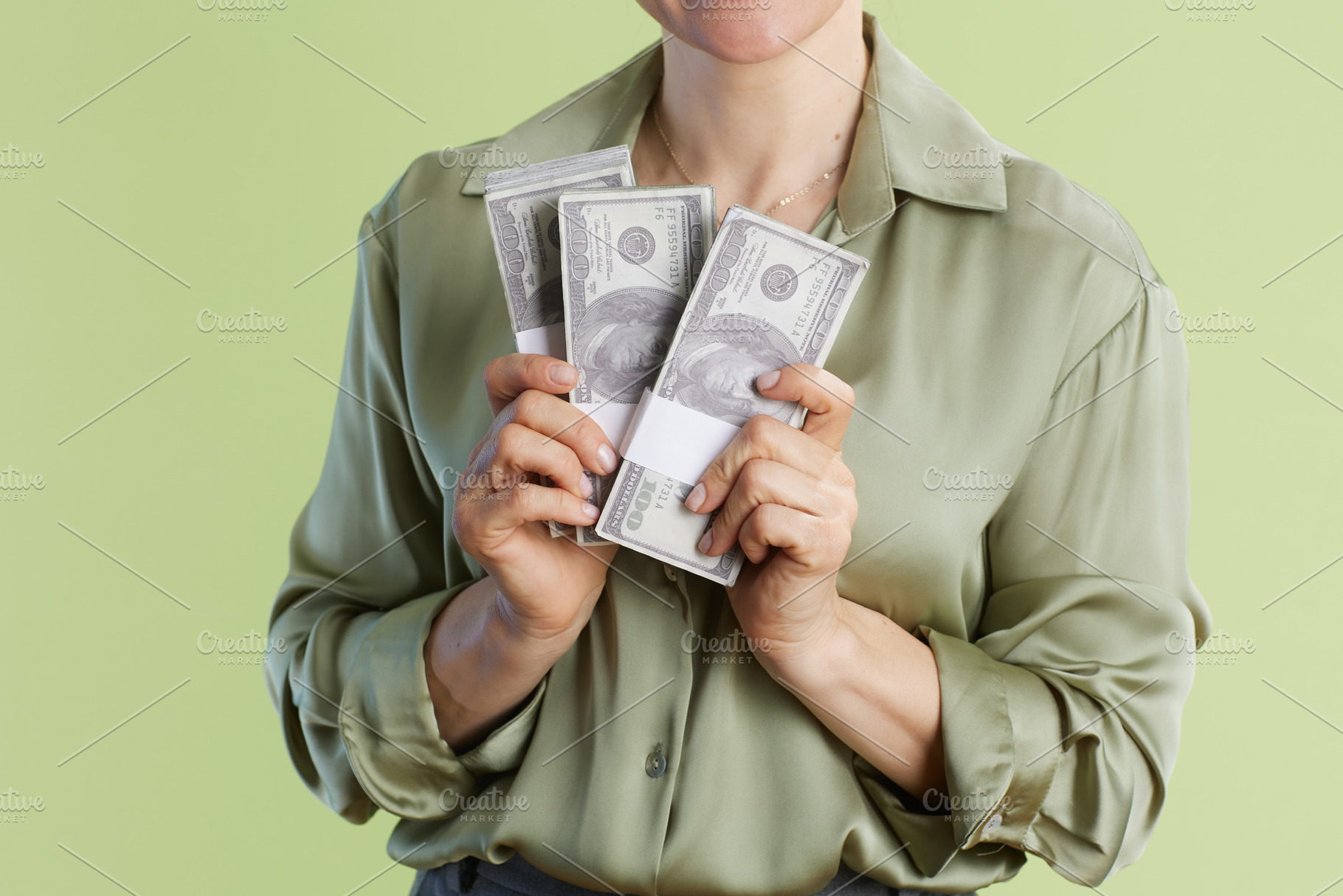 Abundance: Holding Wealth in Green, a Business Photo by Alliance Images