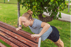 Unaltered woman exercising in a park, a Sports & Recreation Photo by Elizaveta Galitskaya