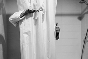 young man, a groom with a beard, gets ready for a wedding in the, a Person Photo by Weddings, People, Travel