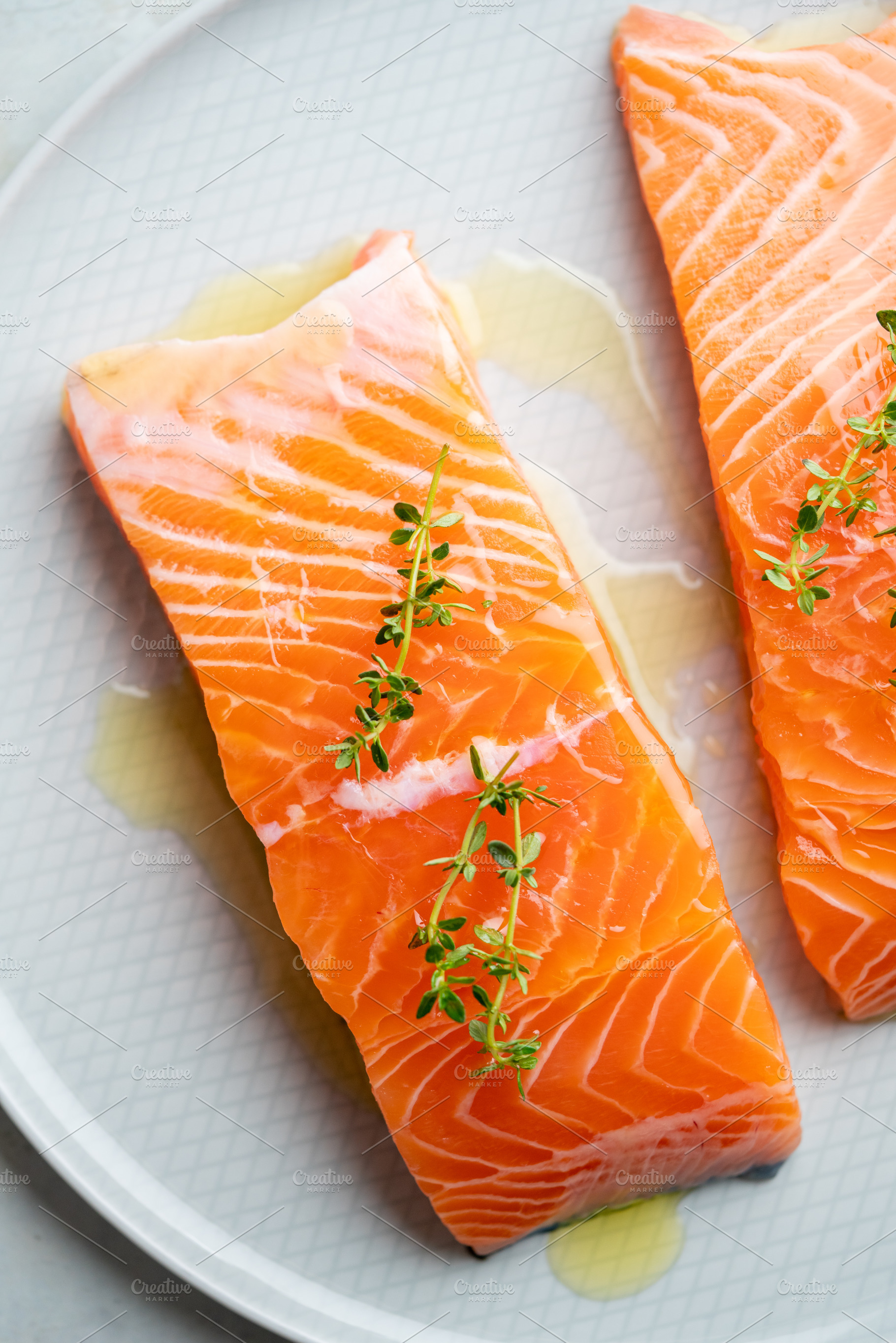 Fresh salmon fillet on a plate for delicious salmon steak., a Food & Drink Photo by FoodStock