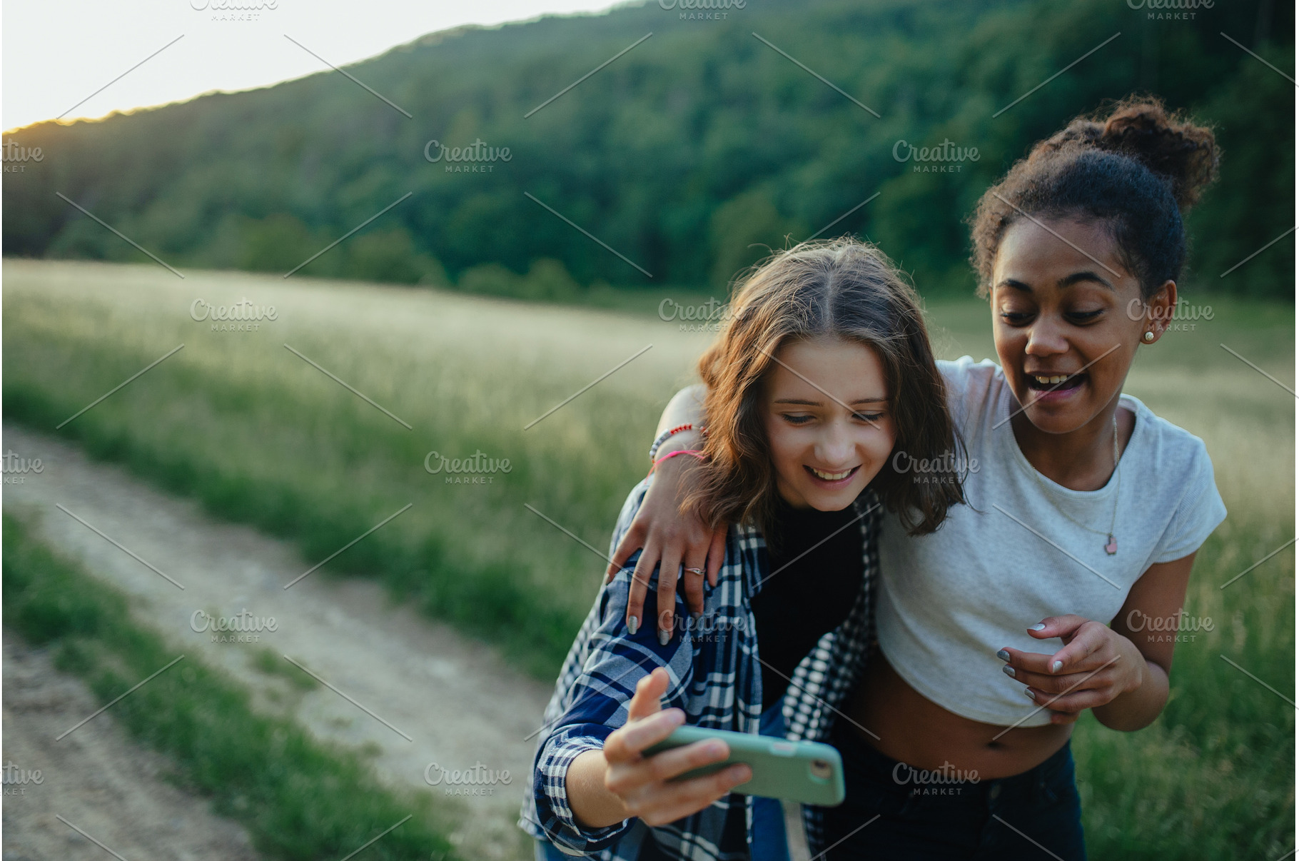 Young teenager girl best friends, a Person Photo by HalfPoint