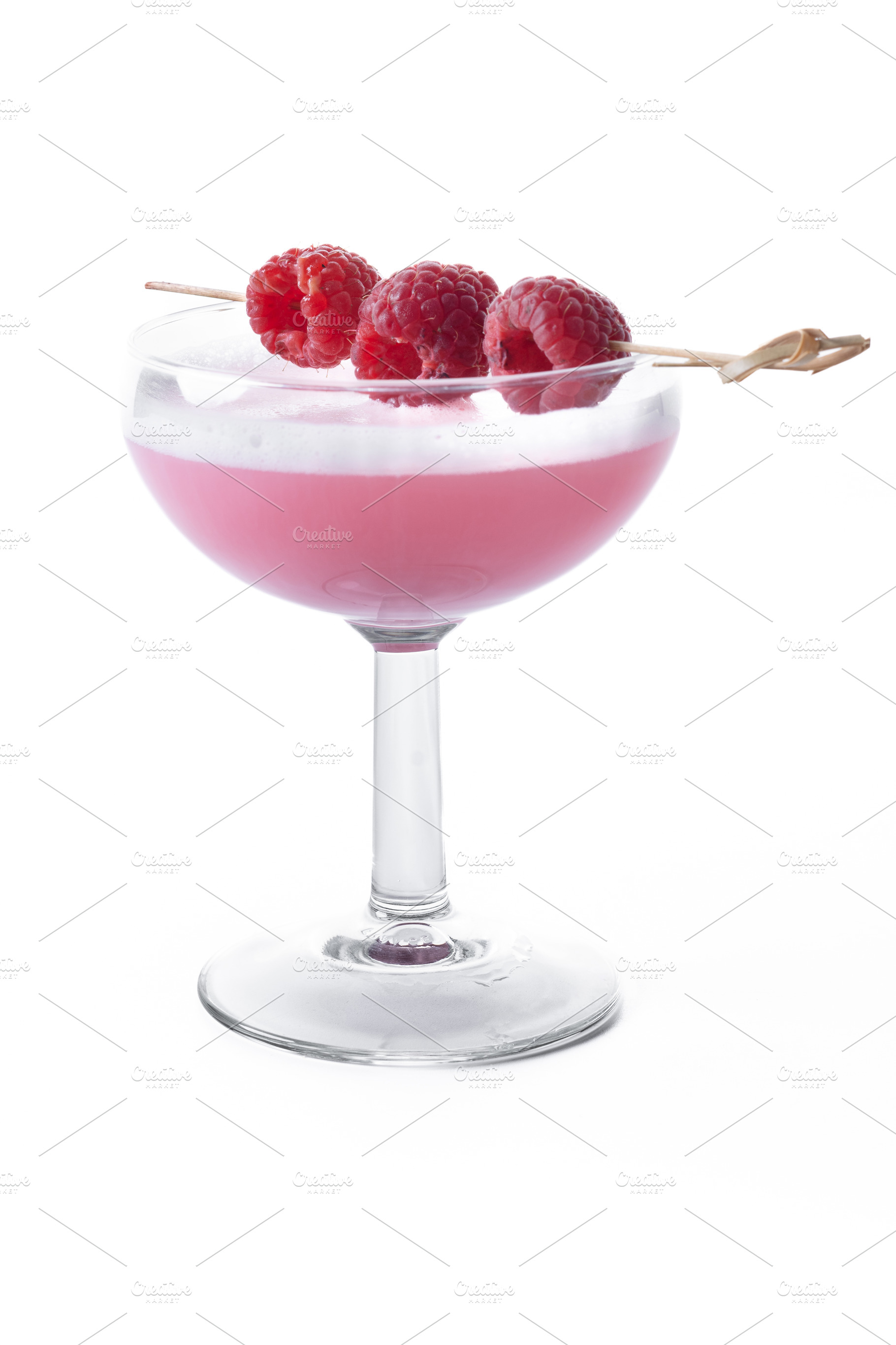 Elegant French Martini Cocktail isolated on white background, a Food & Drink Photo by etorres69