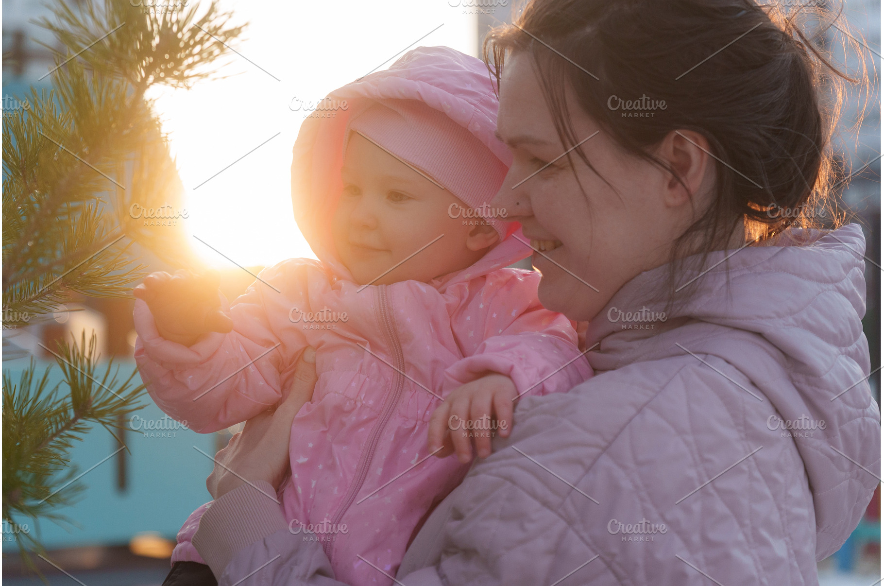 Mother embraces daughter while, a Nature Photo by darksoul72