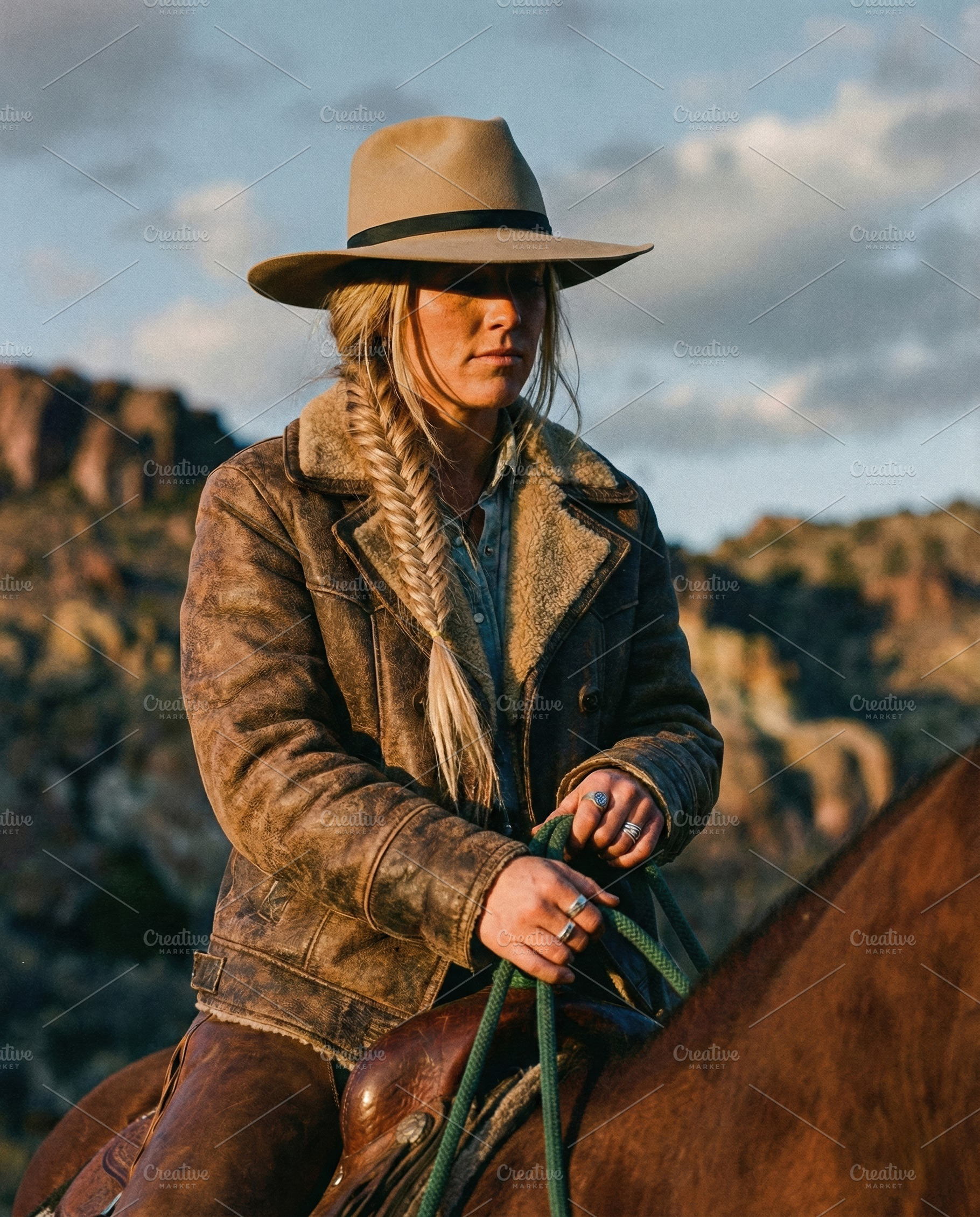 Cowgirl on Horseback with Tan Hat, a Person Photo by Virgo Studio