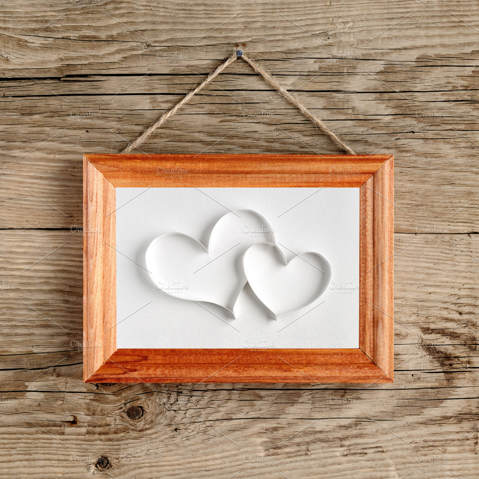 Two Hearts In Old Picture Frame