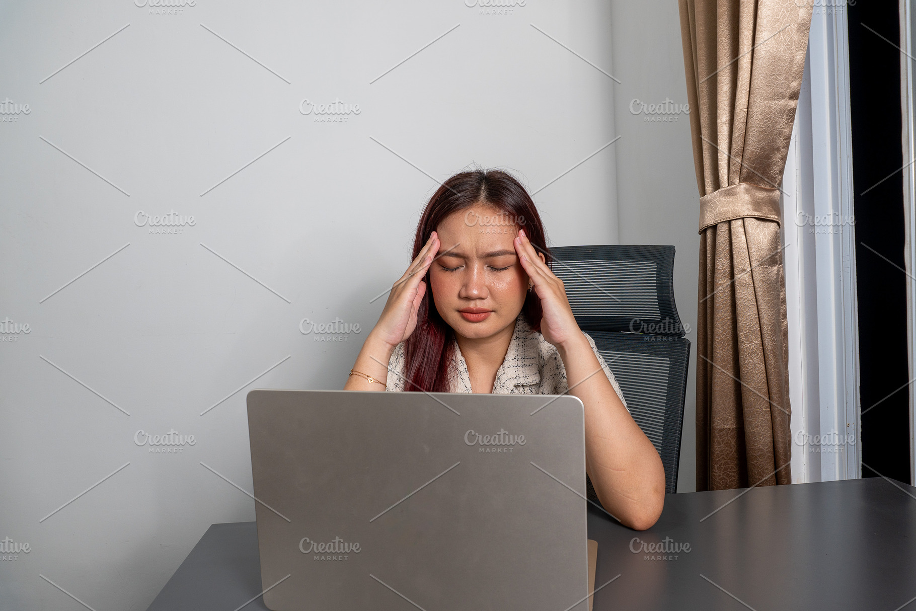 Stressed Office Worker Holding Head, a Person Photo by PanduYudhaSatria