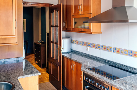 Kitchen on two fronts with wooden furniture, an Architecture Photo by davidpereiras