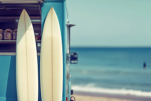 Surfer's paradise with a truck parked near the beach and surfboards ready for a, a Sports & Recreation Photo by AlyaAnd