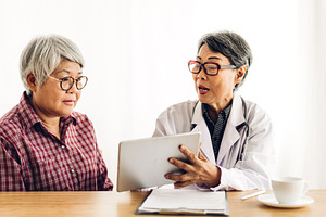 Senior woman doctor wearing uniform with stethoscope service hel