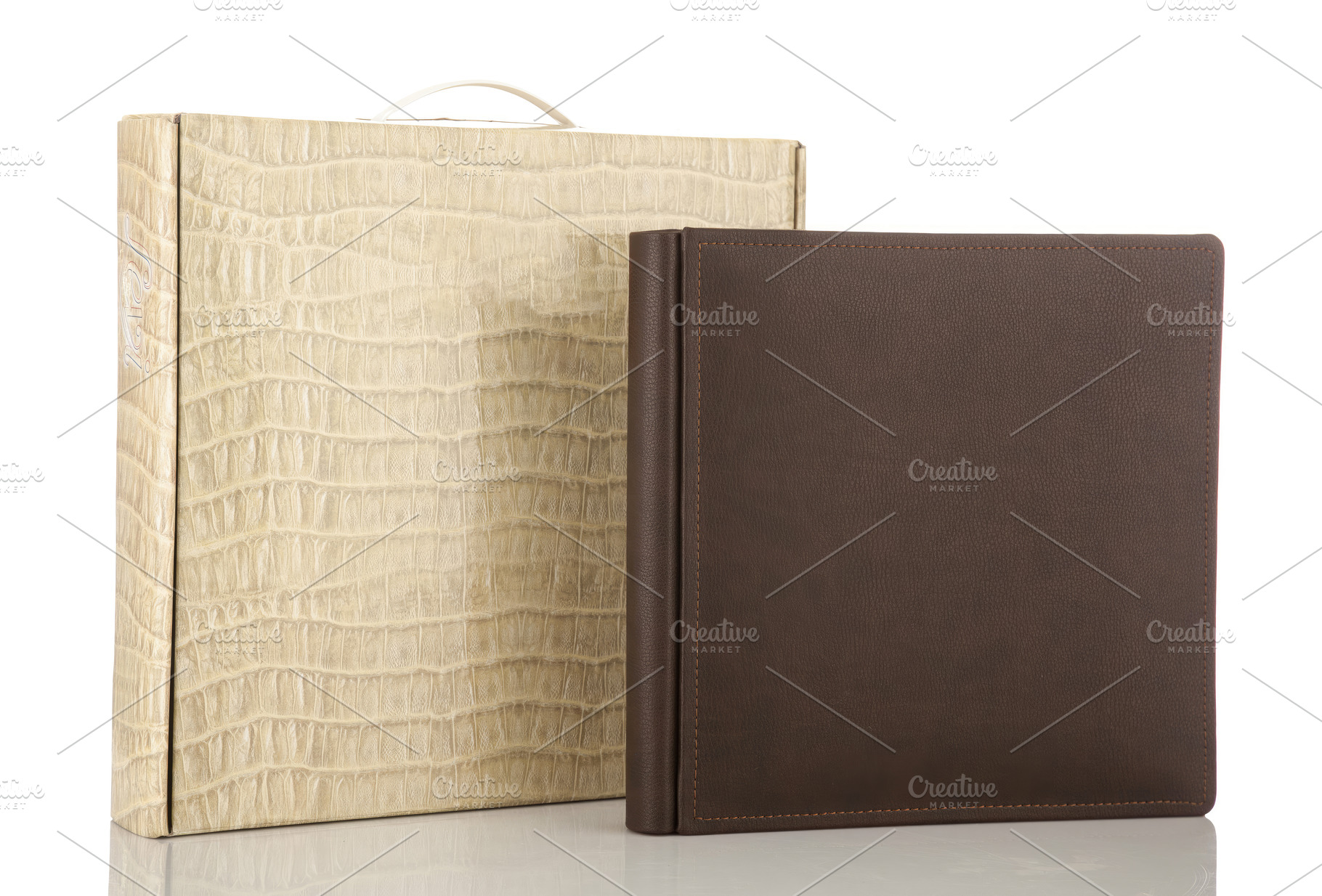 Elegant photo album with its box on white background, an Abstract Photo by Antonio Gravante Market