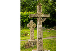 Old oak framed cross in graveyard in, a Nature Photo by Backyard Stock