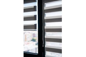 Vertical View of Zebra Window Blinds, an Architecture Photo by volodymyrshtun13795