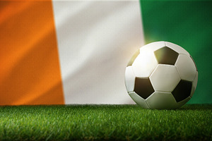 Soccer ball on grass with Ivory Coast flag, a Sports & Recreation Photo by Davizro's Market