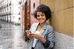 Pretty Afro Woman Using Phone