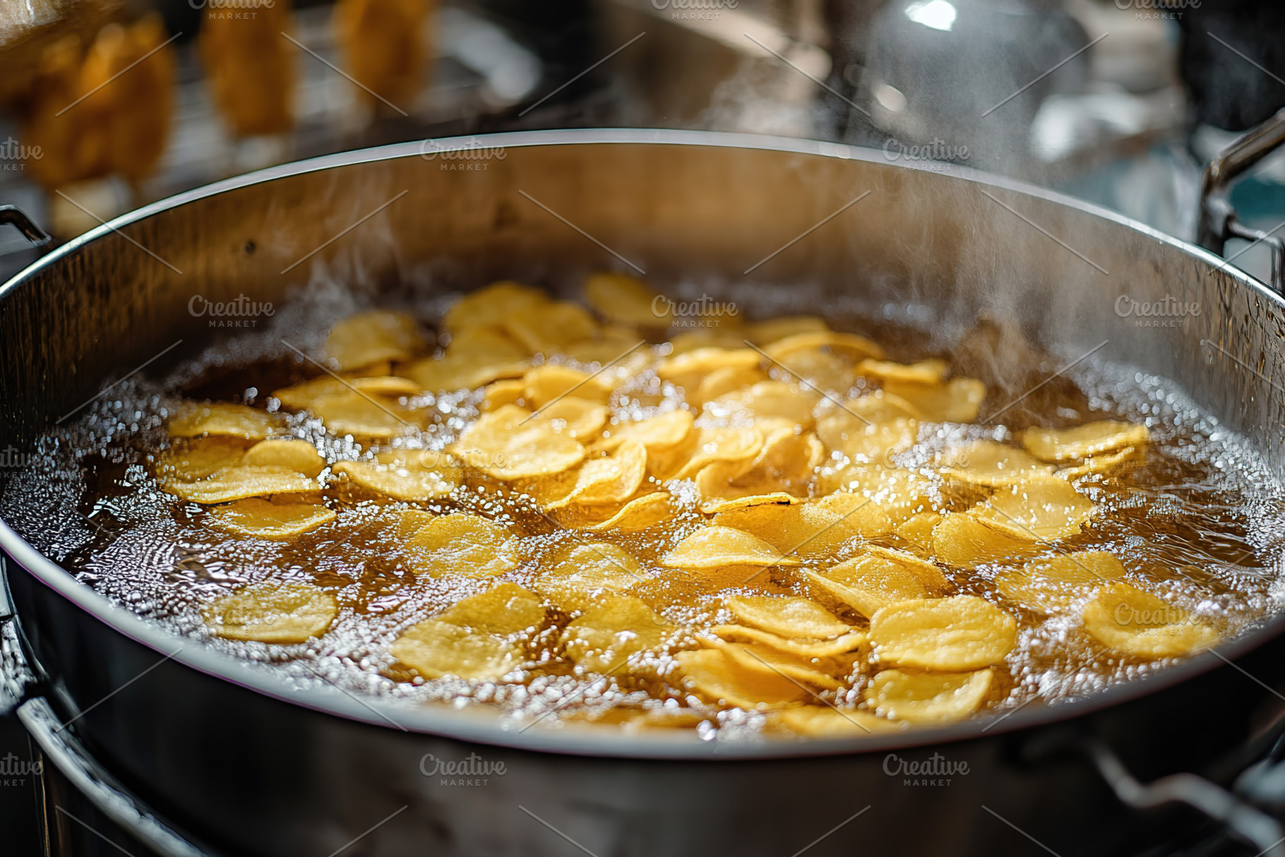 Frying potato chips in oil, a Food & Drink Photo by AlyaAnd