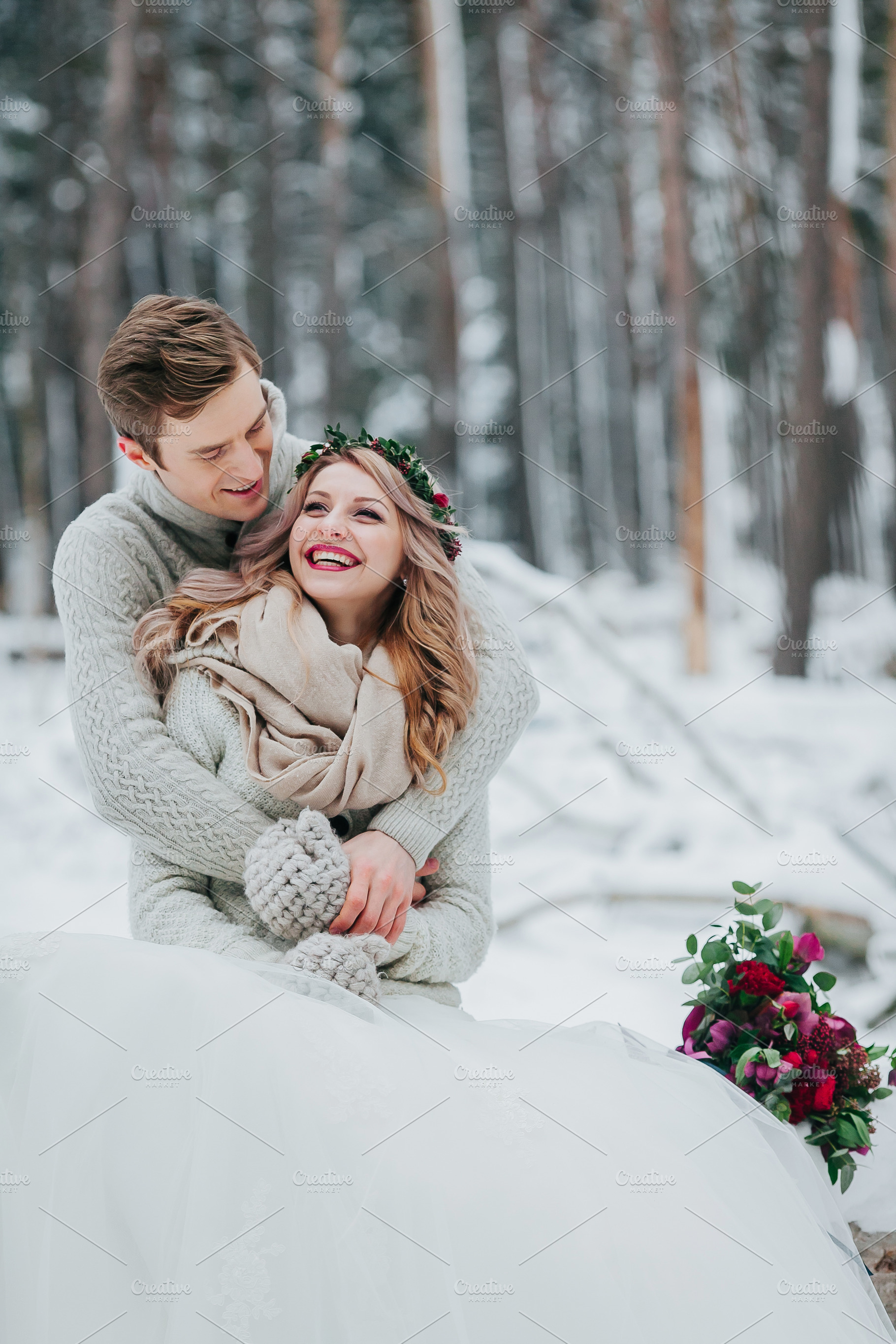 Bride and groom are hugging in the winter forest. Couple in love. Winter wedding ceremony., a Person Photo by Stahov