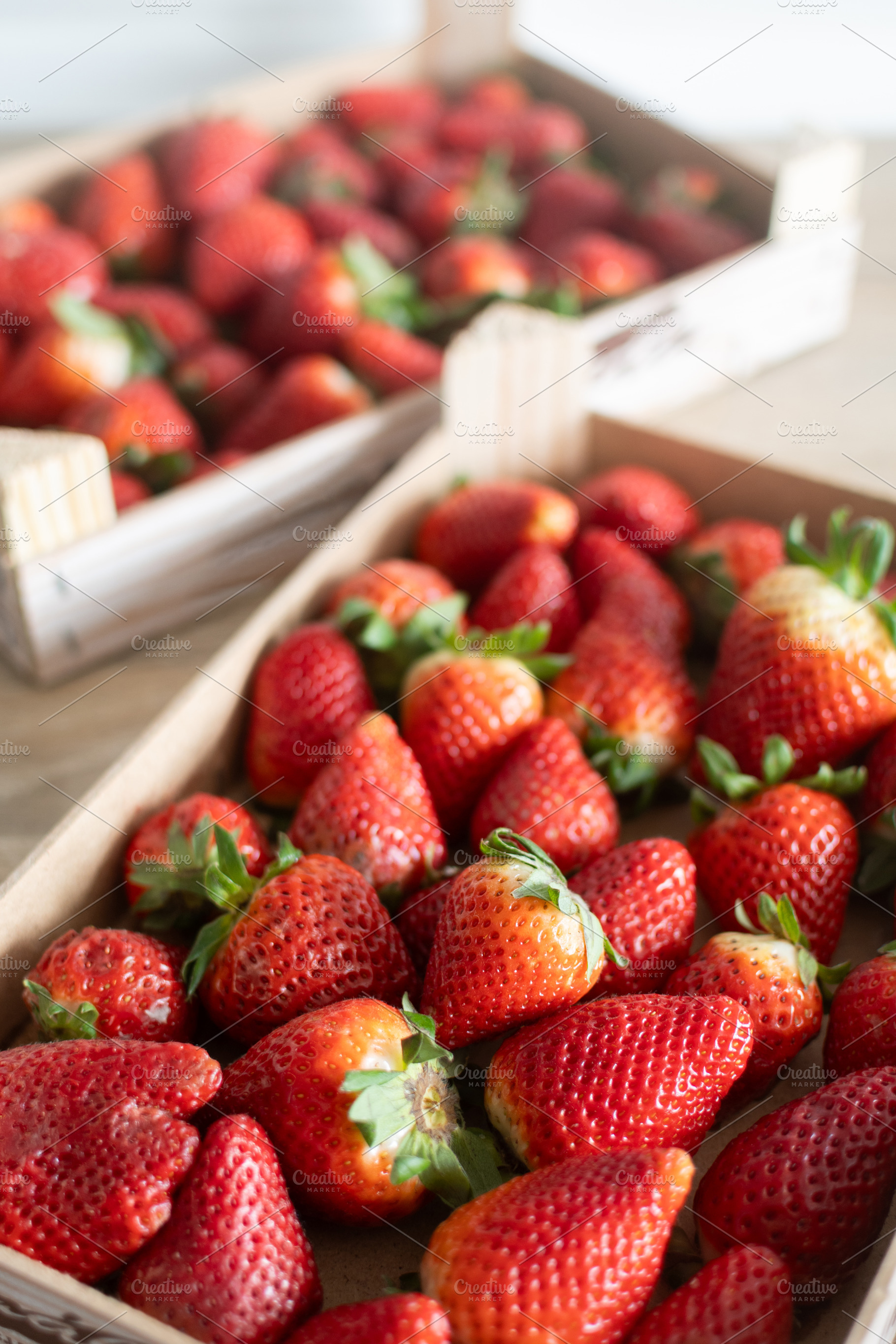 Fresh strawberries on wooden boxes, a Food & Drink Photo by etorres69