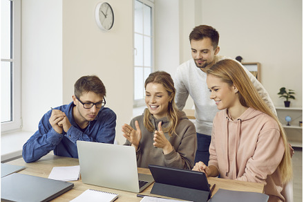 Happy university students using, a School & Education Photo by StudioRomantic