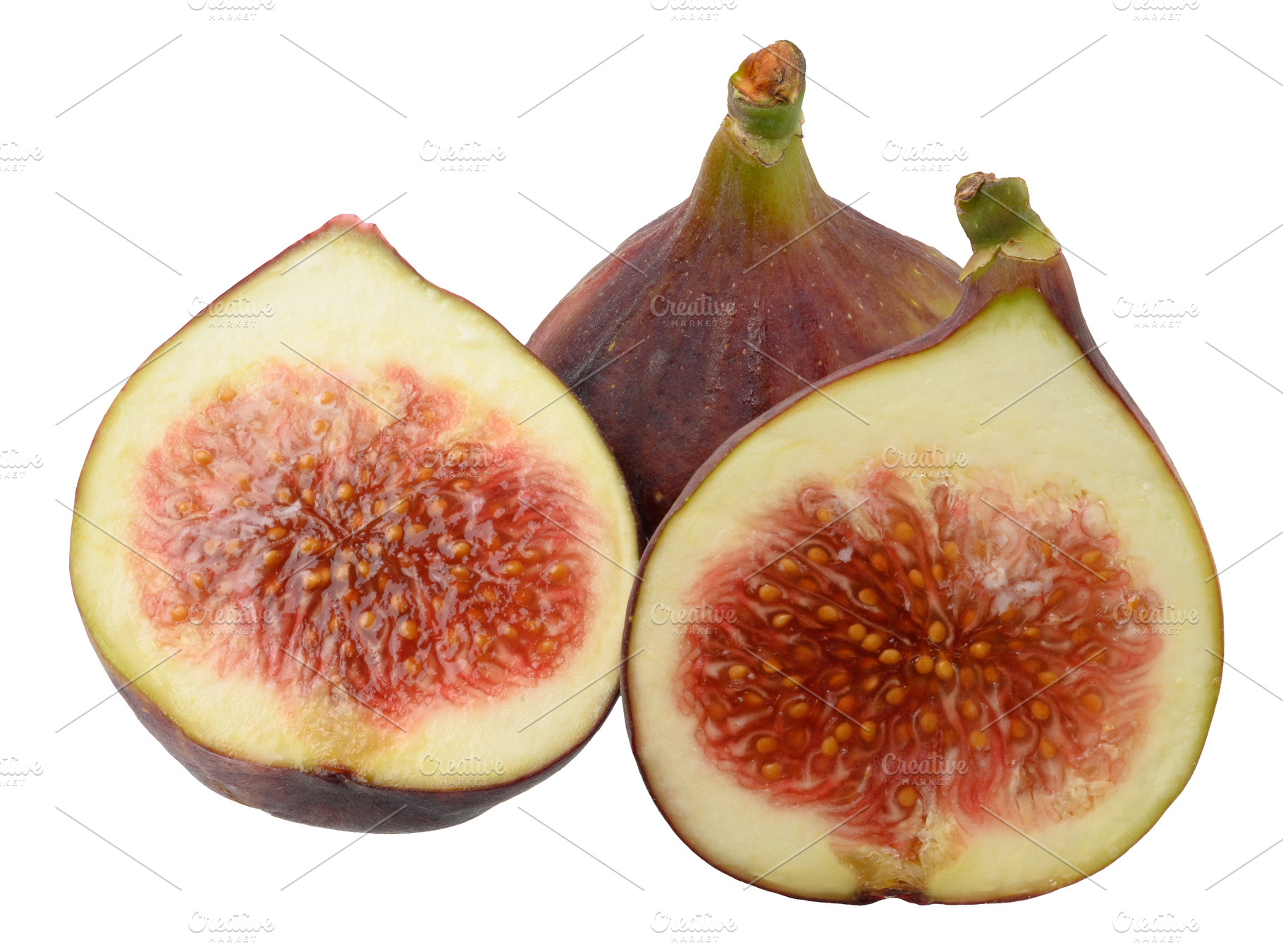 Whole and piece ripe purple figs on isolated background, a Photo by ndanko