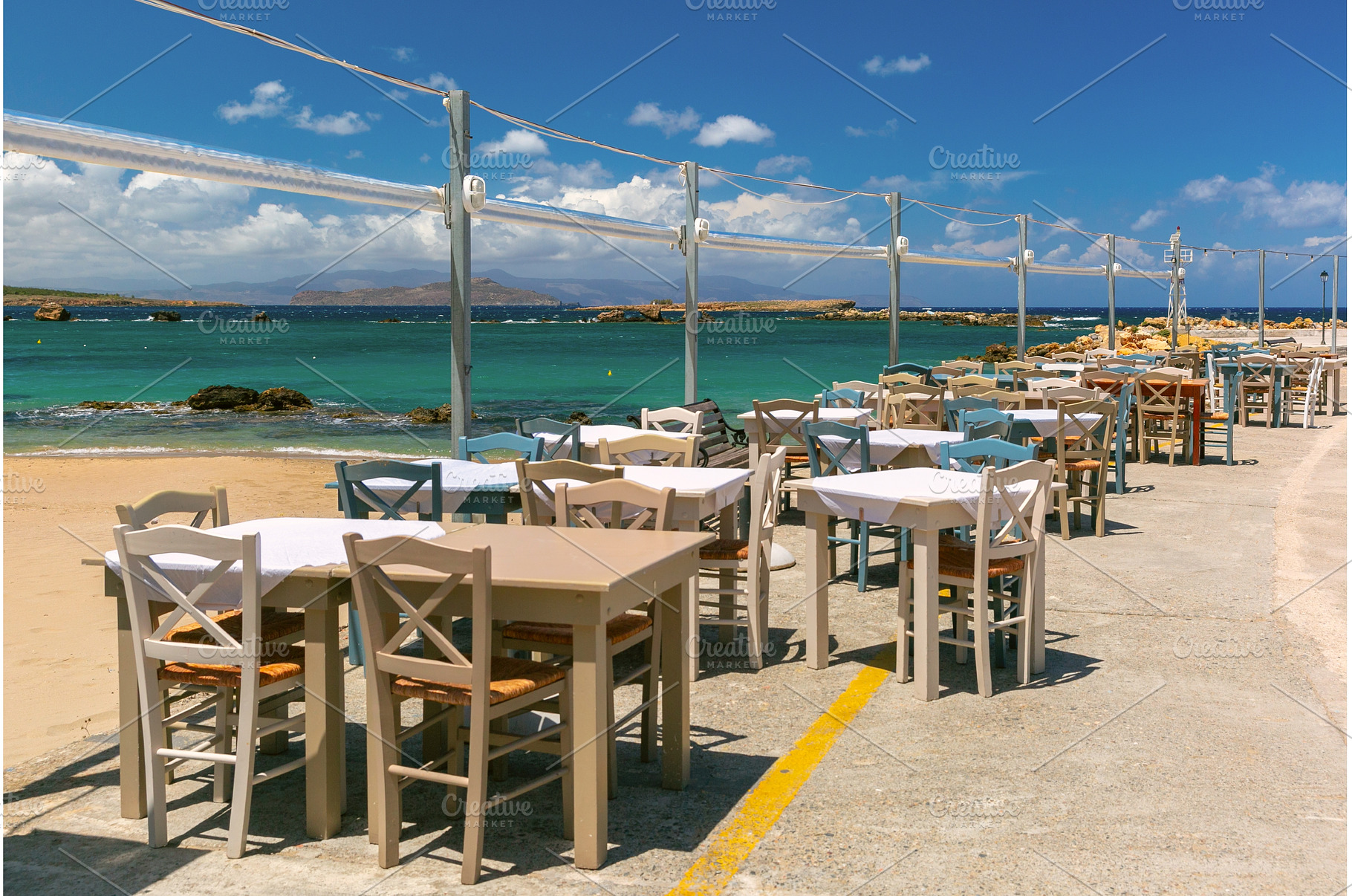 Seaside cafe in Chania Crete Greece, an Architecture Photo by kavalenkava