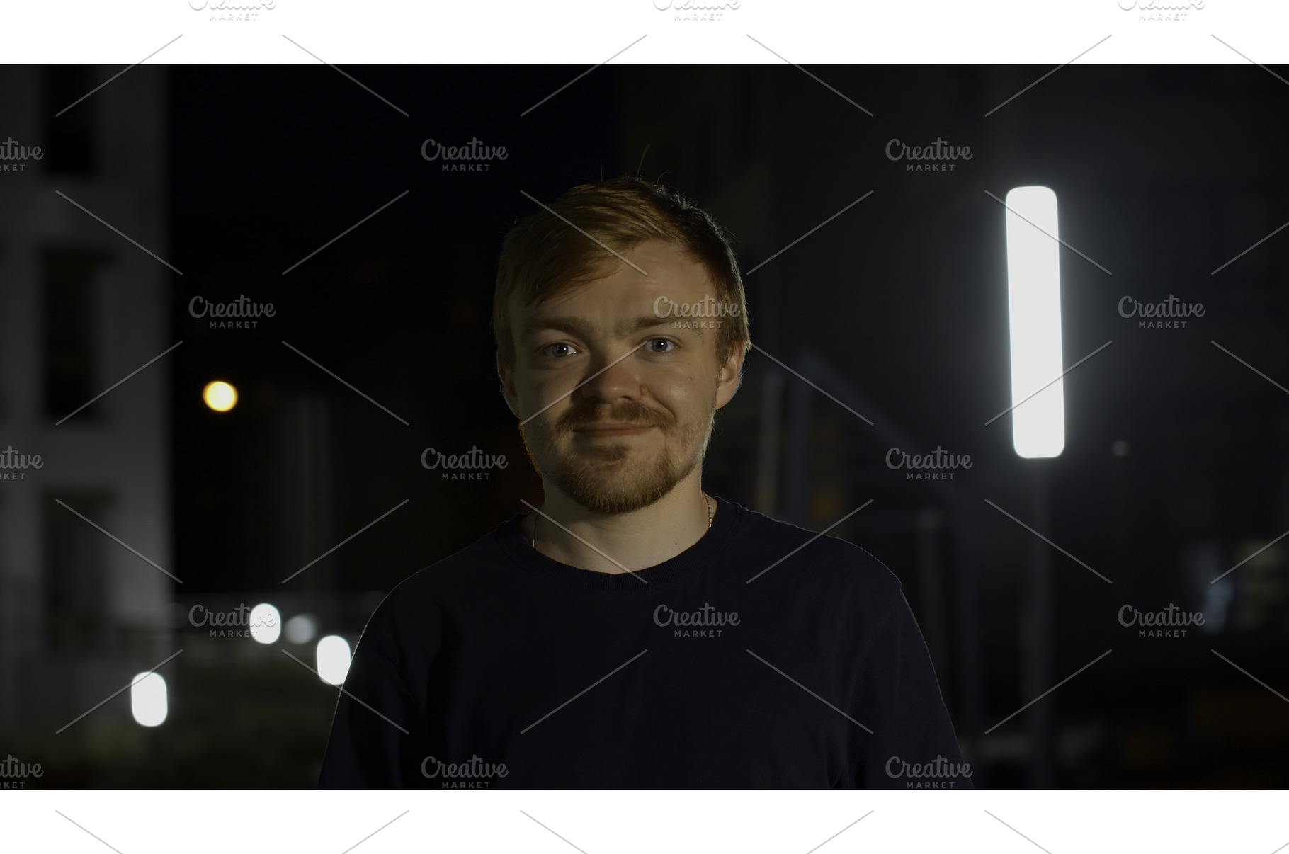 A handsome man posing on the street, a Person Photo by Media Whale Stock