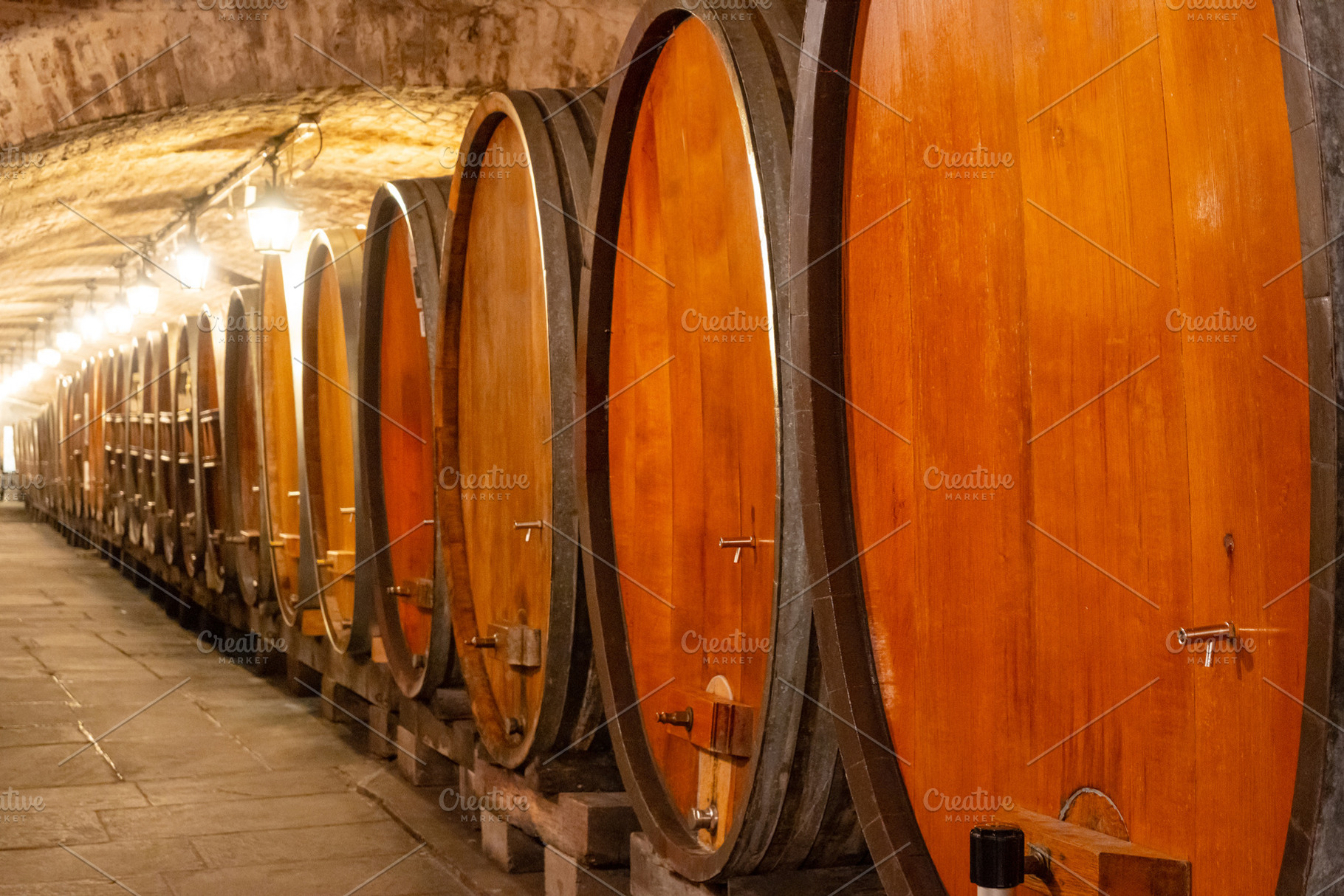 Wine cellar barrels inside historical Strasbourg hospital, an Architecture Photo by GoodGoods