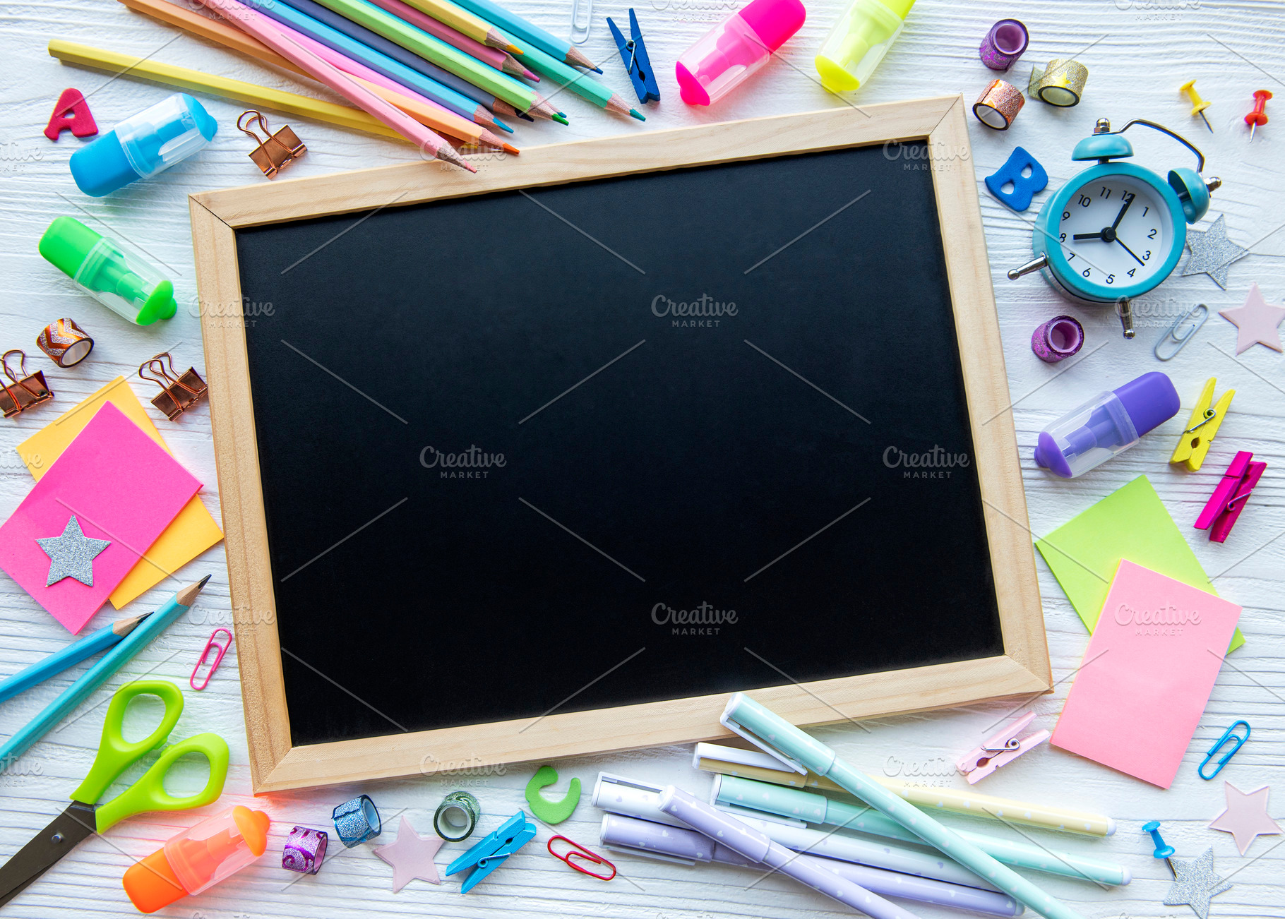 Frame of different stationery on white wooden background, a School & Education Photo by Olena Rudo