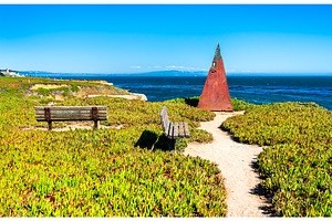 Rusty coastal pyramid sculpture and, a Nature Photo by Leonid Andronov