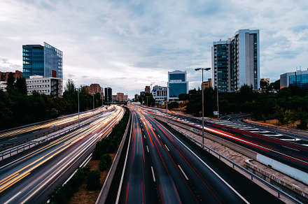 Motorway with light trails at dusk featuring calle 30, highway, and, an Architecture Photo by Architect´s eye