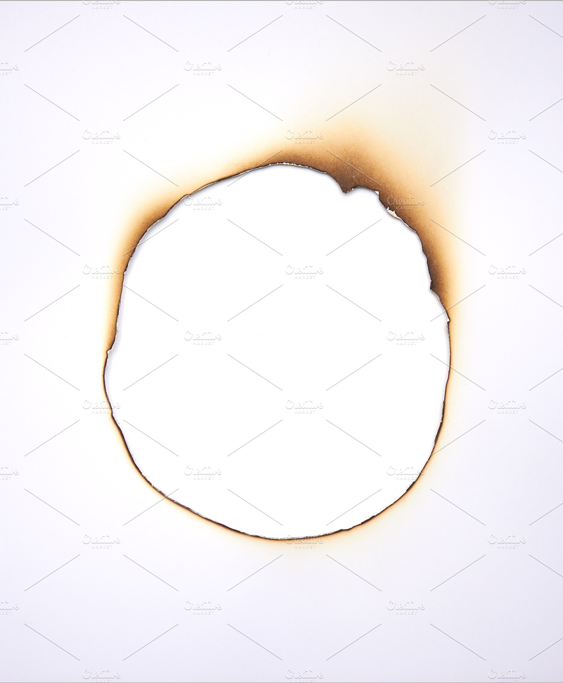 Burned hole within paper, a Background Photo by LaserPrint