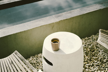 A cup of coffee on a concrete table, a Food & Drink Photo by Valeriia Miller