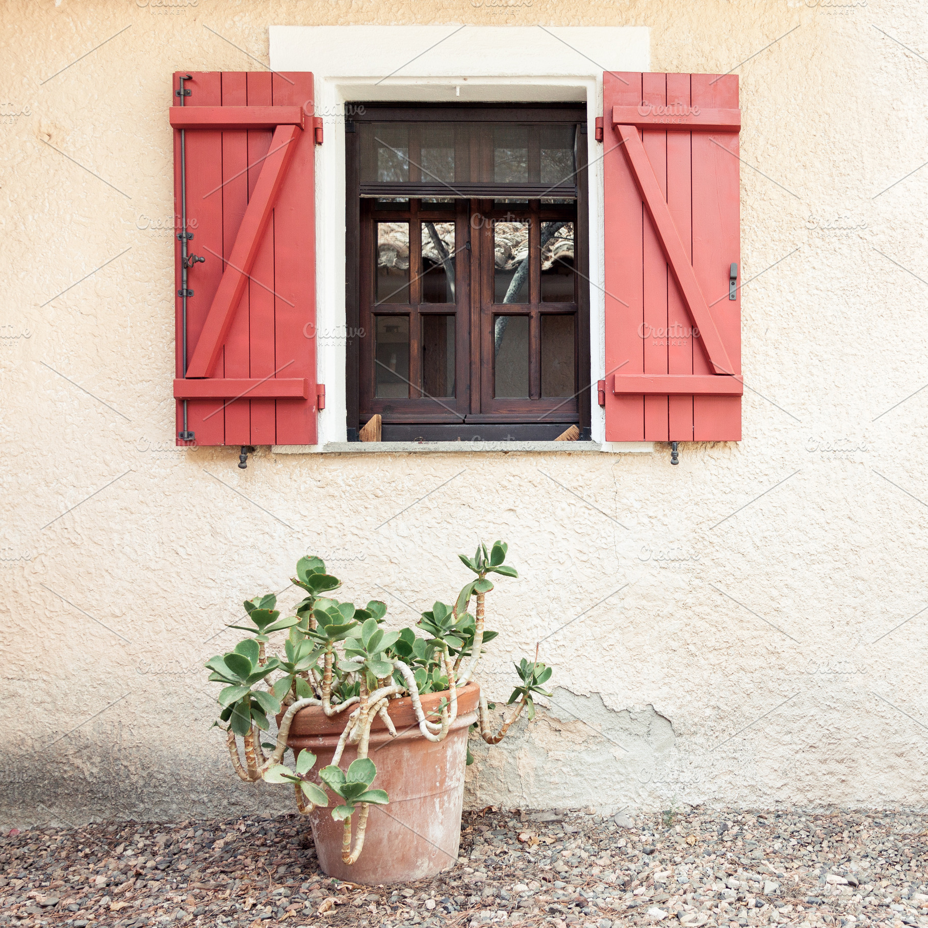Wooden home window with red shutters, an Architecture Photo by BOOCYS