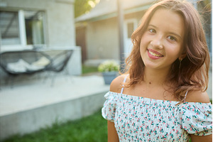Girl standing in garden during, a Nature Photo by IlliaBondarPhotography