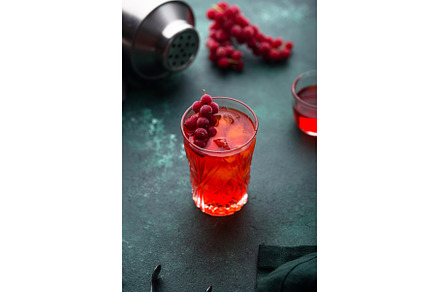 Alcoholic cocktail with red currant, a Food & Drink Photo by Yulia Furman