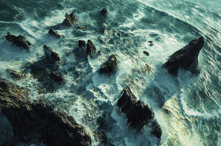 Waves vigorously collide with rugged, a Photo by Tanuart
