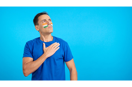 Indian patriot listening to the, a Person Photo by Iván Moreno STOCK PHOTO