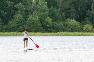 Woman on SUP paddle board, a Sports & Recreation Photo by BOOCYS