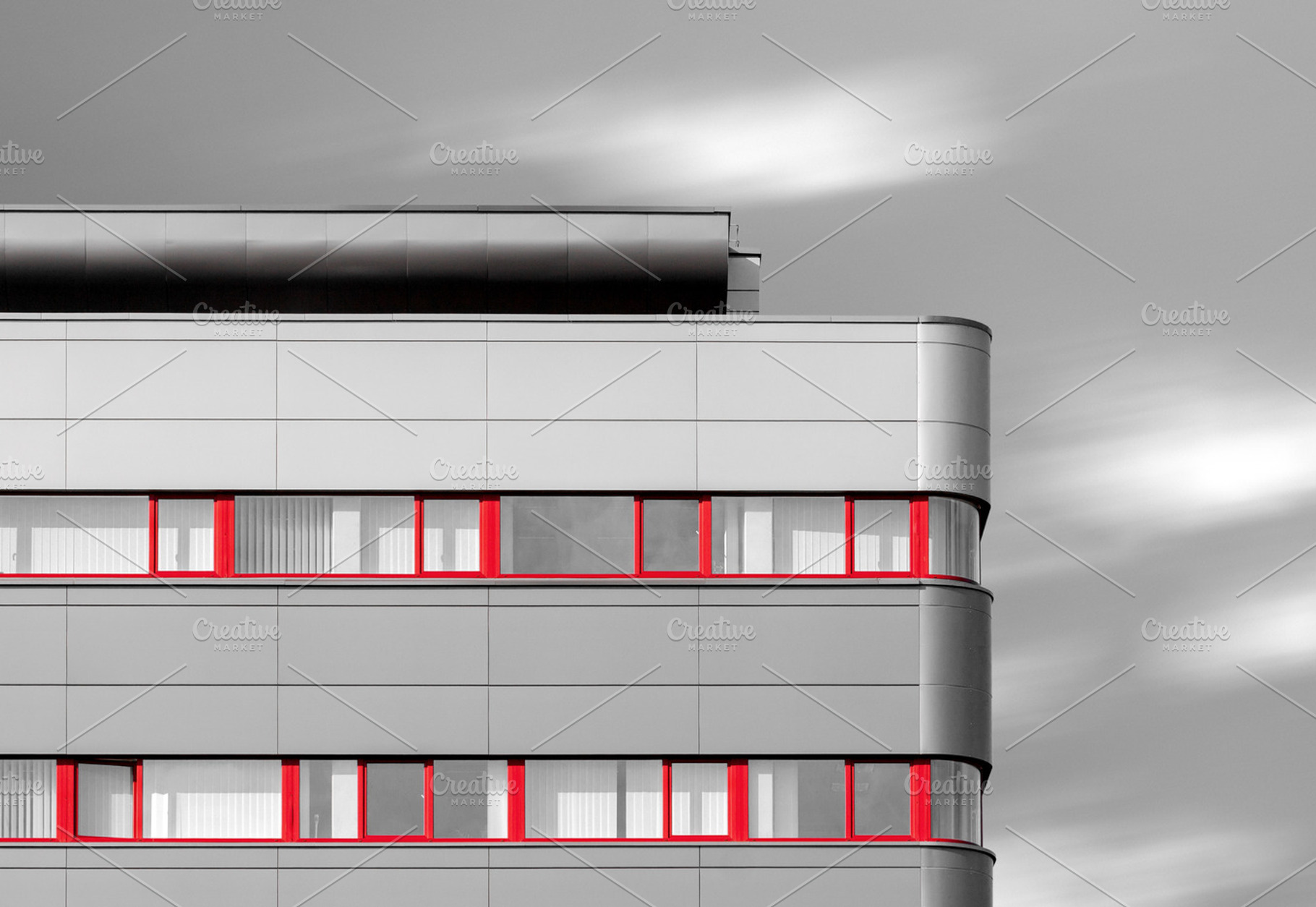 Modern building with red windows, an Architecture Photo by BOOCYS
