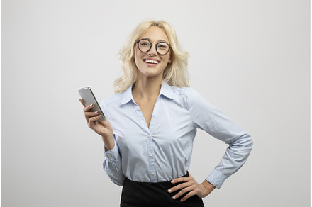 Smiling female CEO in formalwear, a Technology Photo by Prostock-Studio