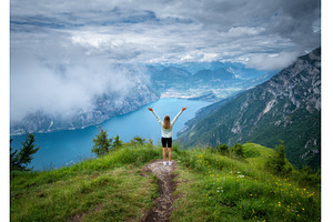 Young woman on the trail on mountain, a Person Photo by den-belitsky